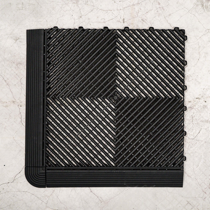 Swisstrax Ribtrax Pro Jet Black Tile with ramps and a corner attached