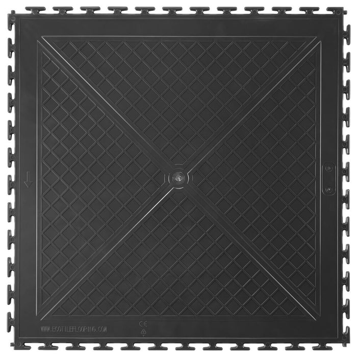 The back of a Graphite T Joint interlocking Ecotile raised disc floor tile