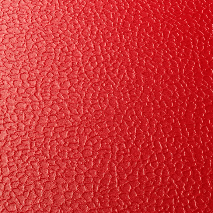 Close up of surface of a Red T Joint interlocking Ecotile floor tile