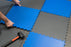 Special edition dark gray garage floor tiles laid in a checked design