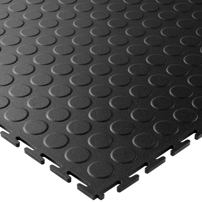 Black T Joint interlocking Ecotile floor tile with Raised Disc surface finish on a white background